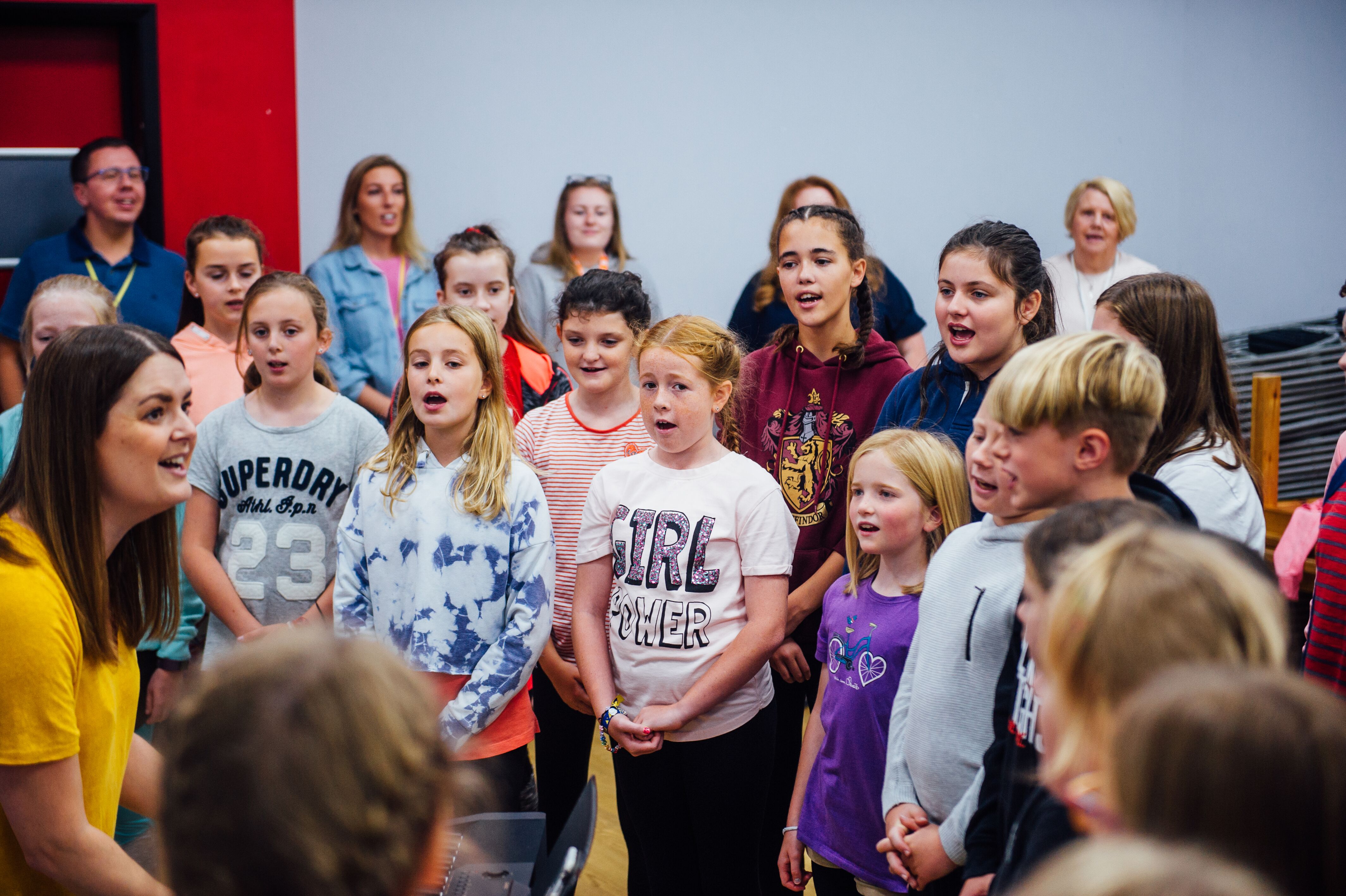 Ground of Children singing at a rehearsal