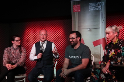 Tic Ashfield, Gareth Roberts, Mark Woods and Claire Ritchie present on stage at Creative Cardiff's second birthday Show and Tell
