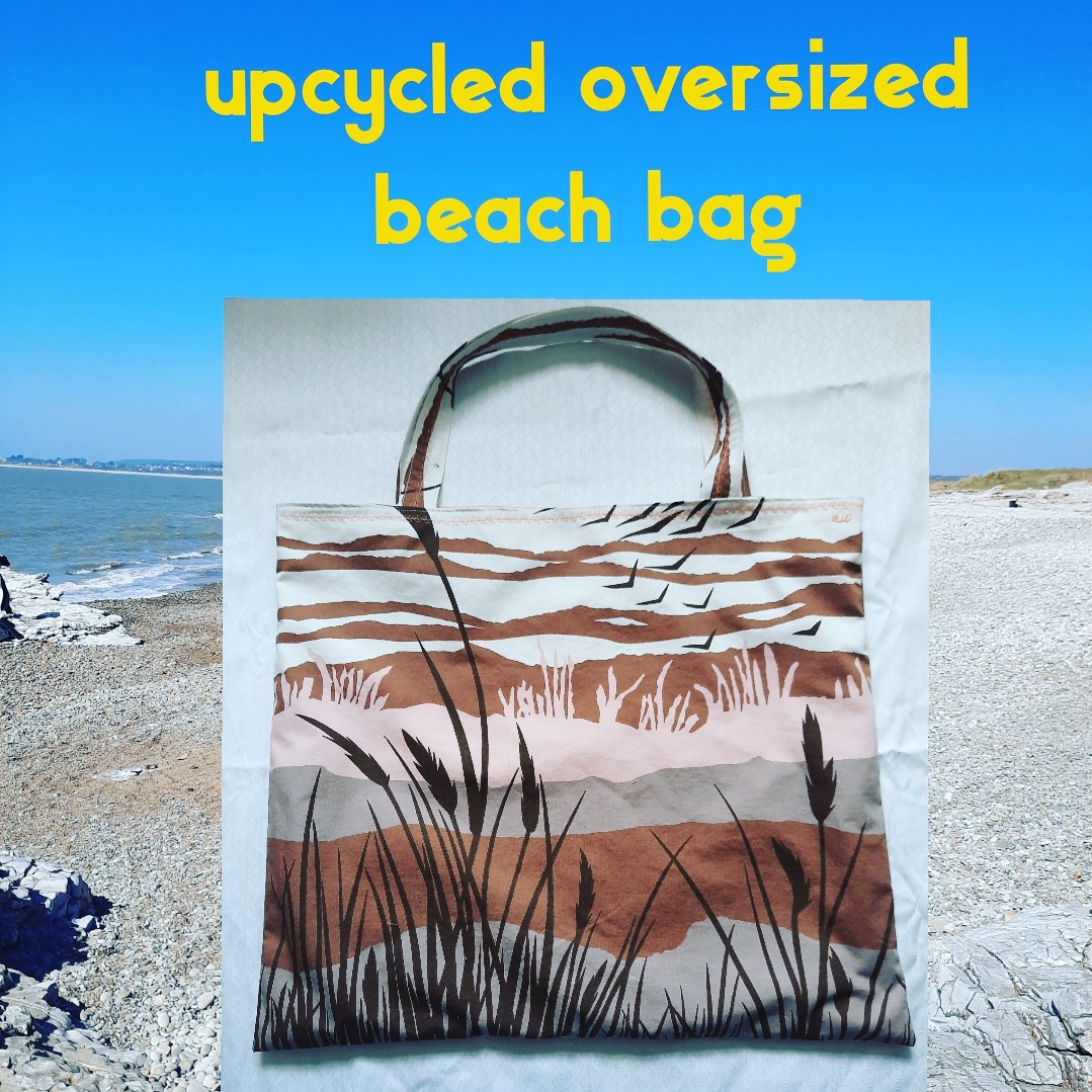This is a beach bag made from donated fabric 