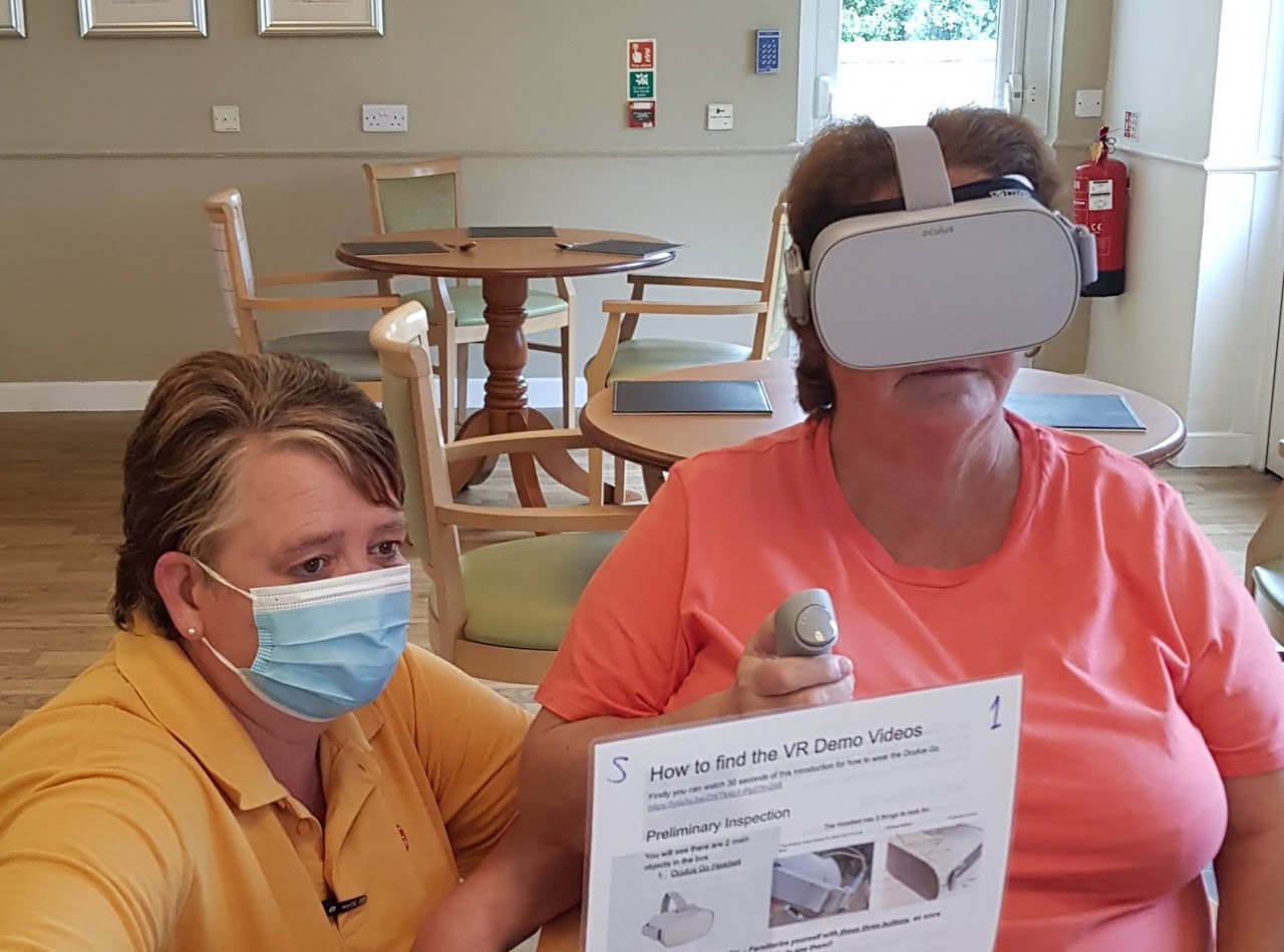Resident in care home watching our VR video content